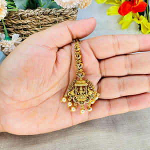 The Devangana Lakshmi Maang Tikka in Antique Gold