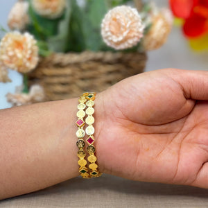 Antique Gold-Plated Lakshmi Kasu Bangles with Kemp Accents.
